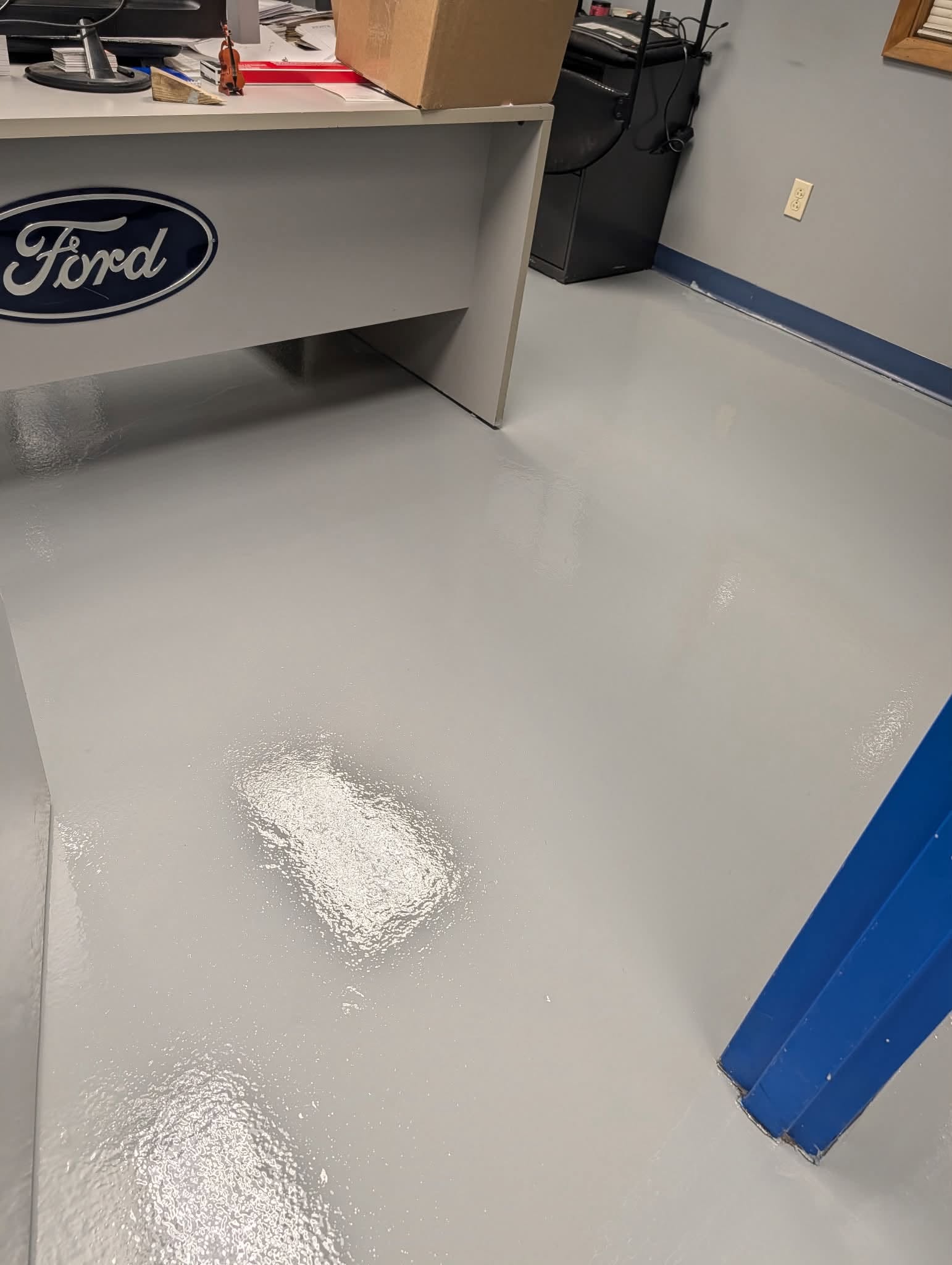 Finished floor around the Ford service counter